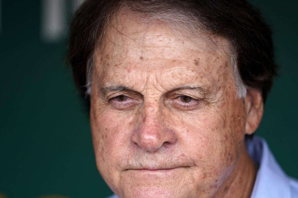 Chicago White Sox manager Tony La Russa talks to reporters in the dugout before a baseball game against the Oakland Athletics in Oakland, Calif., Sunday, Sept. 11, 2022. (AP Photo/Godofredo A. Vásquez)