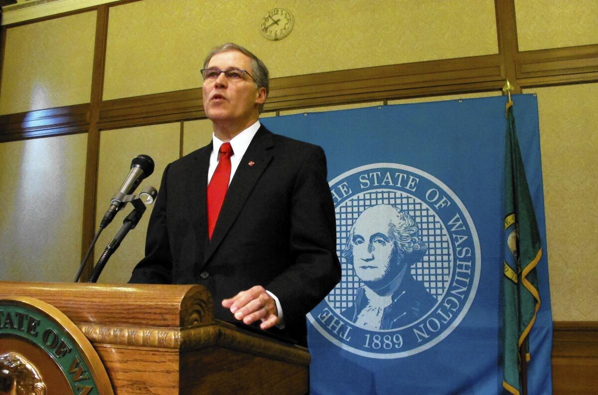 Washington Gov. Jay Inslee is seen on Tuesday announcing that he is suspending the use of the death penalty. Inslee's moratorium, which will be in place for as long as he is governor, means that if a death penalty case comes to his desk, he will issue a reprieve, which isn't a pardon and doesn't commute the sentences of those condemned to death.