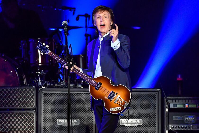 Paul McCartney performs on opening night of his 2016 One on One tour in Fresno, Calif.