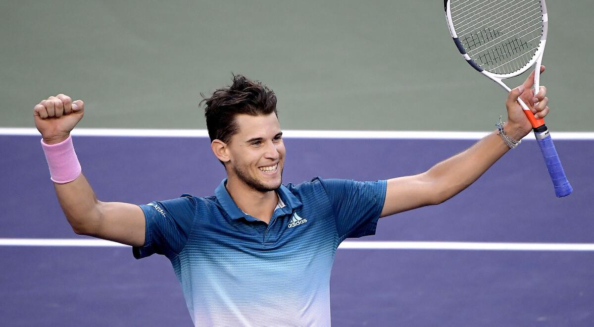 Dominic Thiem celebrates after defeating Roger Federer in the men's final of the BNP Paribas Open on Sunday in Indian Wells.
