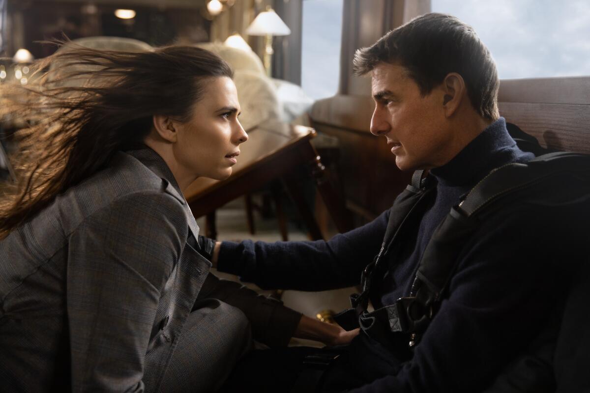 A female thief and the superspy who recruited her on a runaway train in "Mission: Impossible Dead Reckoning - Part One."