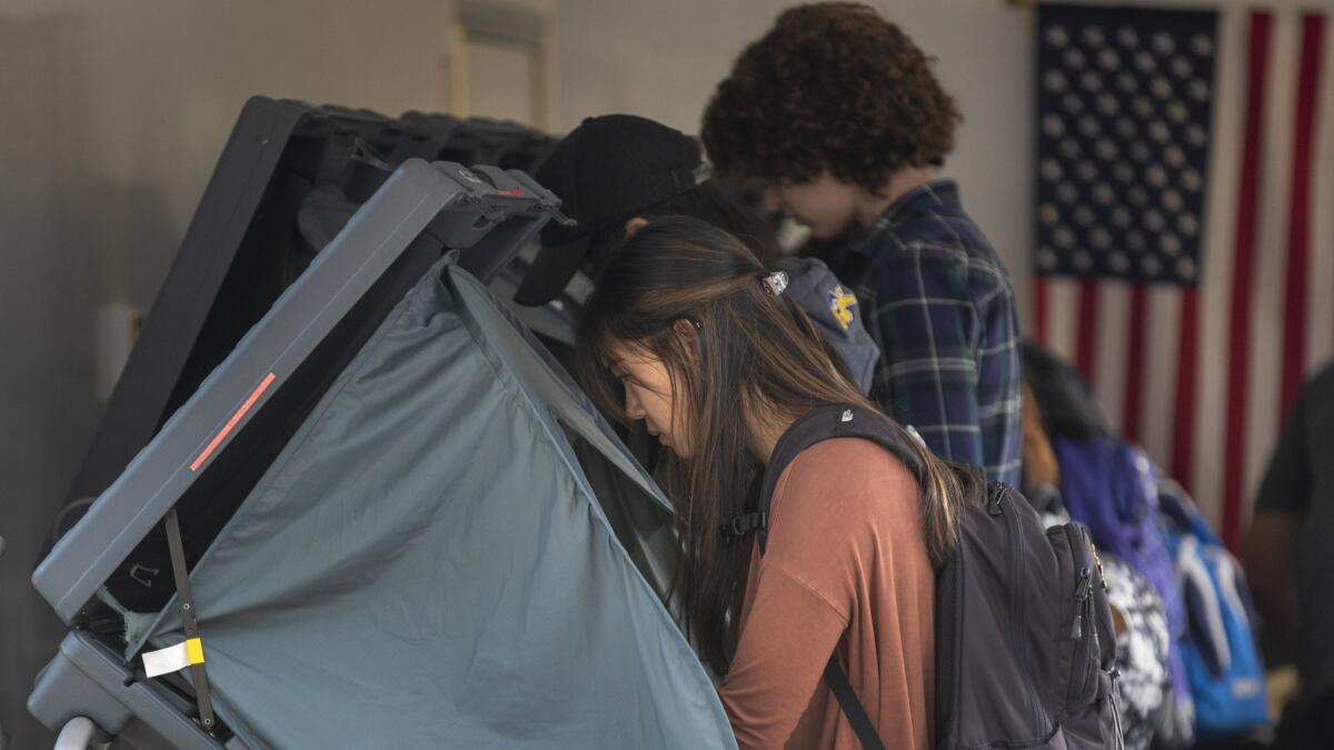 Voters cast ballots early on the campus of UC Irvine.