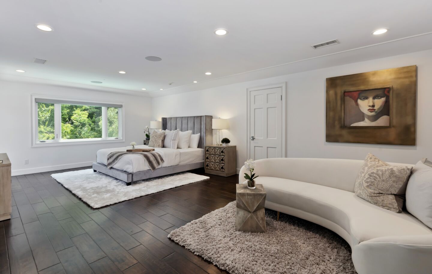 The master bedroom has a sitting room.