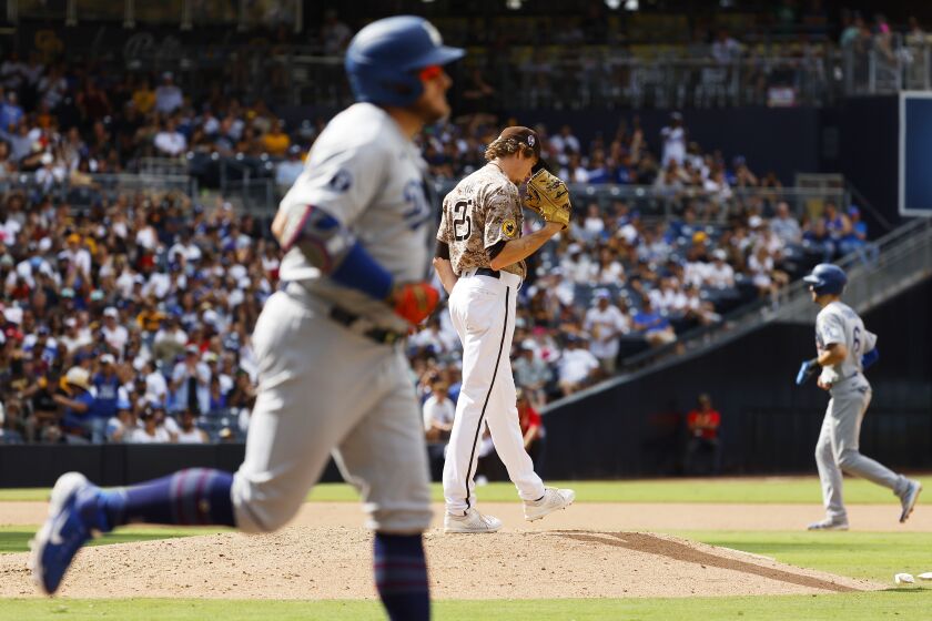 SAN DIEGO, CA - SEPTEMBER 11: San Diego Padres pitcher Tim Hill walked in a run in the seventh inning against the Los Angeles Dodgers at Petco Park on Sunday, September 11, 2022. (K.C. Alfred / The San Diego Union-Tribune)