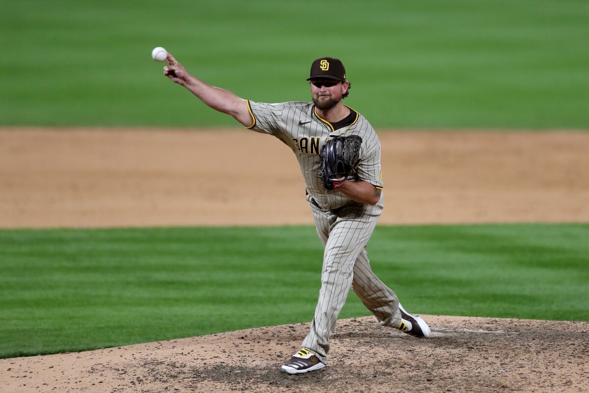 Padres closer Kirby Yates pitches in Friday's ninth inning against the Rockies