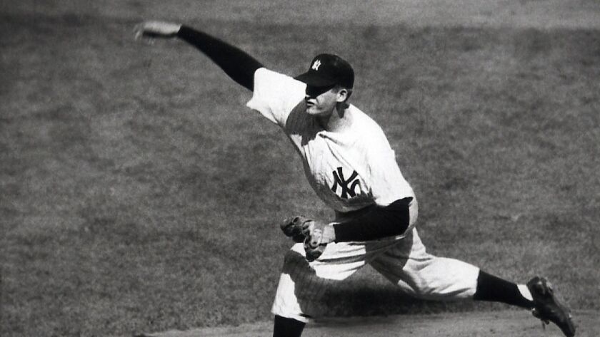 New York Yankees right-hander Don Larsen delivers a pitch against the Brooklyn Dodgers during his perfect game in the World Series on Oct. 8, 1956.