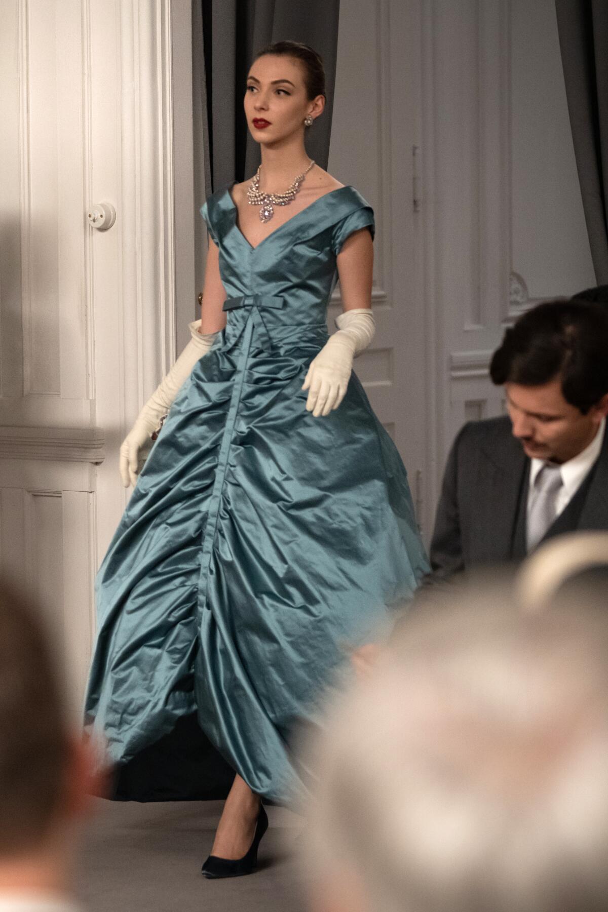 mrs harris goes to paris green dress Mrs. Harris Goes to Paris" is a 2022 historical comedy-drama film directed by Anthony Fabian. Set in 1950s London, it follows a widowed cleaning lady, Ada Harris (Lesley Manville), who becomes enamored