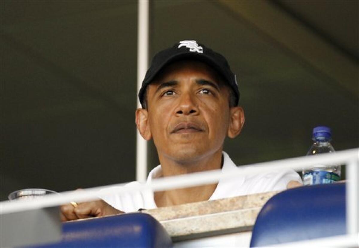President Barack Obama attends an interleague baseball game between the Chicago White Sox and the Washington Nationals, Friday, June 18, 2010 in Washington.(AP Photo/Pablo Martinez Monsivais)