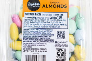 LOS ANGELES, CA, DECEMBER 26, 2024: Store bought grocery items that contain red dye #3, including Signature Select Jordan almonds, are photographed at the Los Angeles Times on December 26, 2024. High doses of red dye #3 were found to cause cancer in lab animals decades ago. A federal law known as the Delaney Clause says no compound shown to cause cancer in animals or humans can be in the food supply. The FDA acknowledged the cancer studies decades ago and used the findings to deny a request to approve the dye's use in cosmetics, however, red #3 was already being used in food, and for some reason its authorization has not yet been revoked. (Christina House / Los Angeles Times)