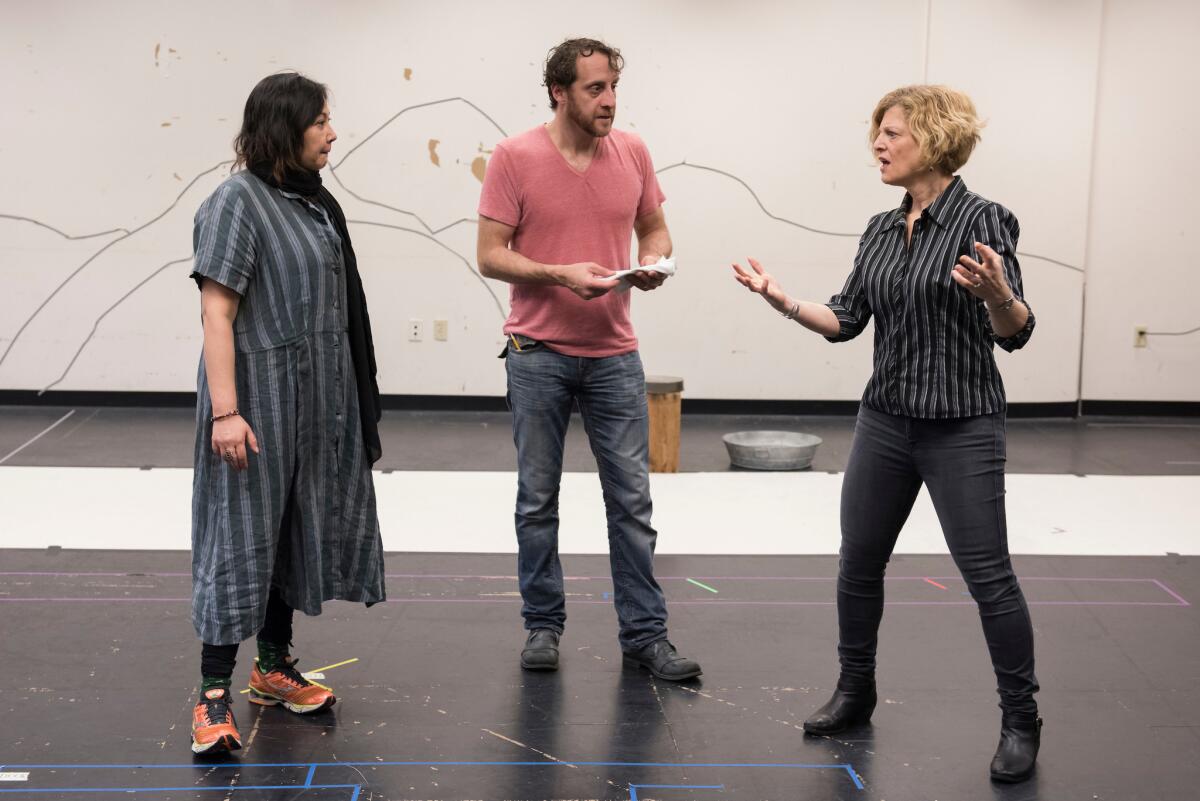 Carey Perloff, ACT's artistic director, right, rehearses a scene with actors Kate Rigg and Haysam Kadri. (Stefan Cohen)