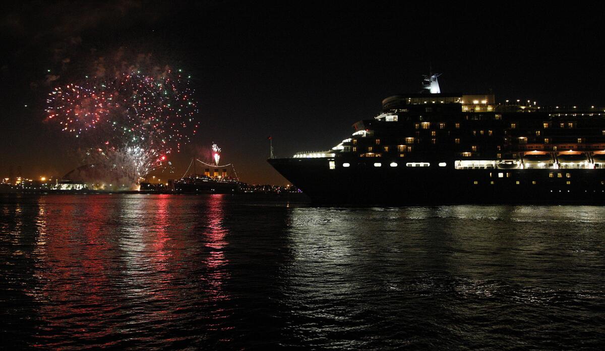 The Queen Elizabeth (foreground) entered Long Beach harbor in 2013. It will visit and dock next week for the first time.