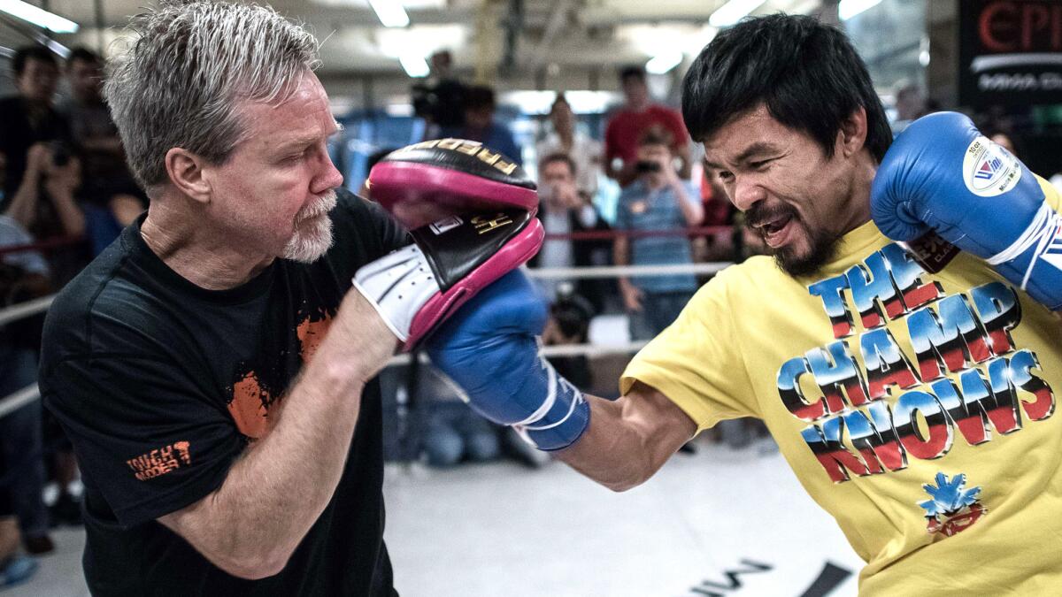 Freddie Roach, left, is the longtime trainer of boxing legend Manny Pacquiao.