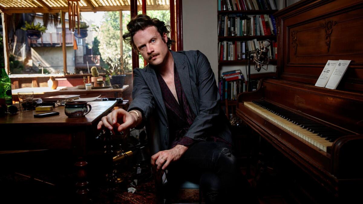Father John Misty, in his Los Angeles home on March 13, has a new album, "Pure Comedy," and is set to play Coachella next month.