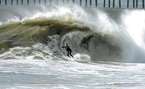 About 25 miles south of downtown Los Angeles, the normally-placid Seal Beach turned tidal with 15-foot waves.