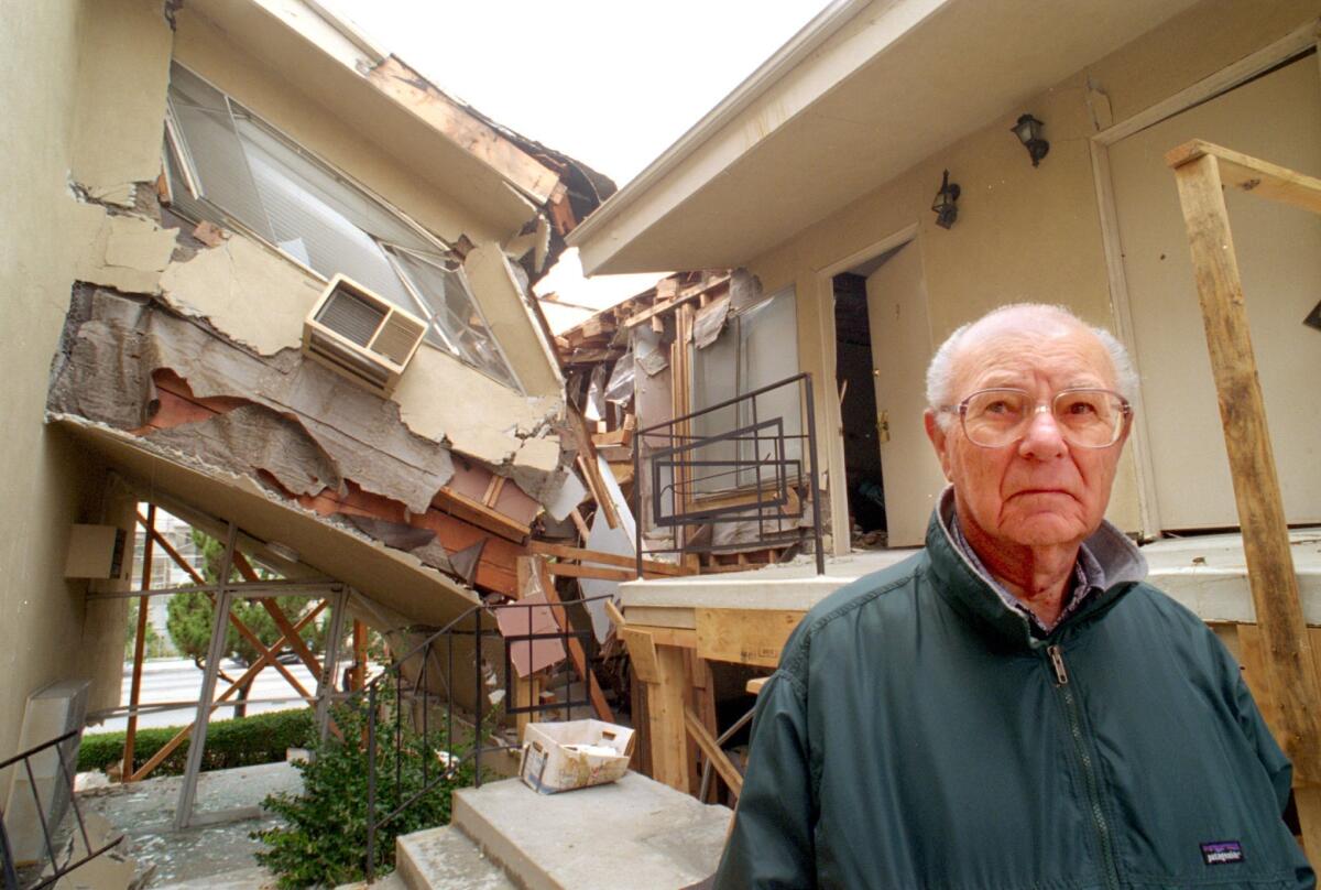 After the 1994 Northridge earthquake, Kenneth Shaffer, with one of his Sherman Oaks buildings, says he lost nearly a quarter of the units he had accumulated over a lifetime of investment. (Ken Lubas / Los Angeles Times)