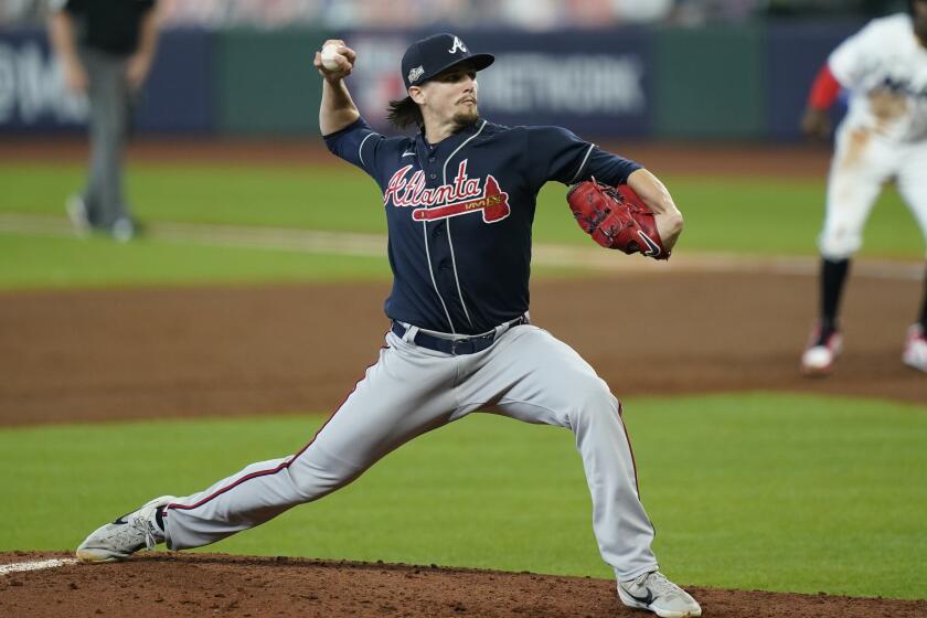 Atlanta Braves starting pitcher Kyle Wright throws during the second inning in Game 3.