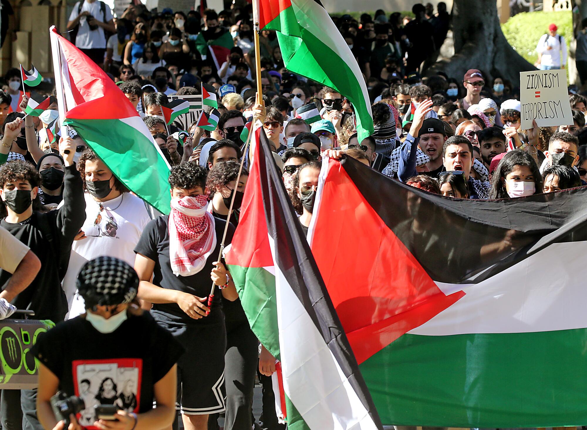  Students march across the UCLA campus in support of Palestinians. 