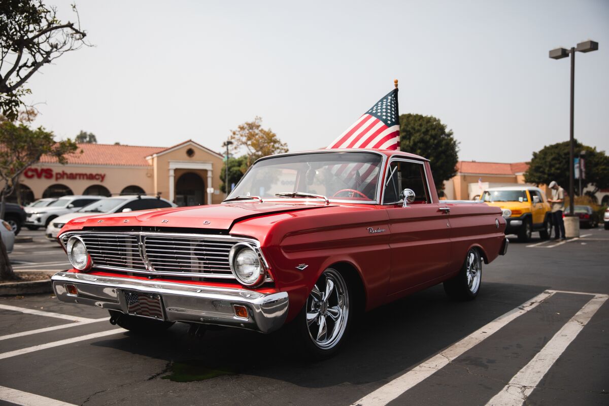 Al Sherwood’s Ford Ranchero with an American flag placed on it. 