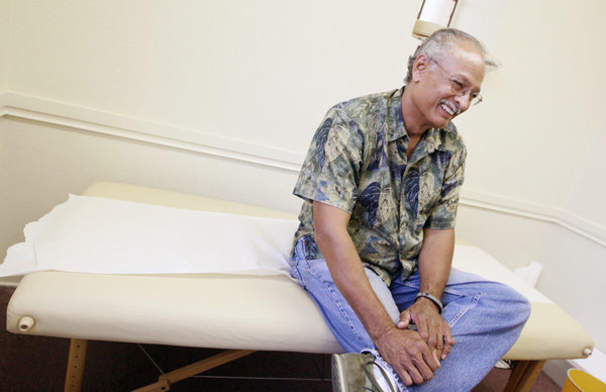 Temple City resident Stephen Houlemard talks about getting health insurance throughout the Affordable Healthcare Act during a visit to the Glendale Free Health Clinic on Tuesday, Oct. 15, 2013.