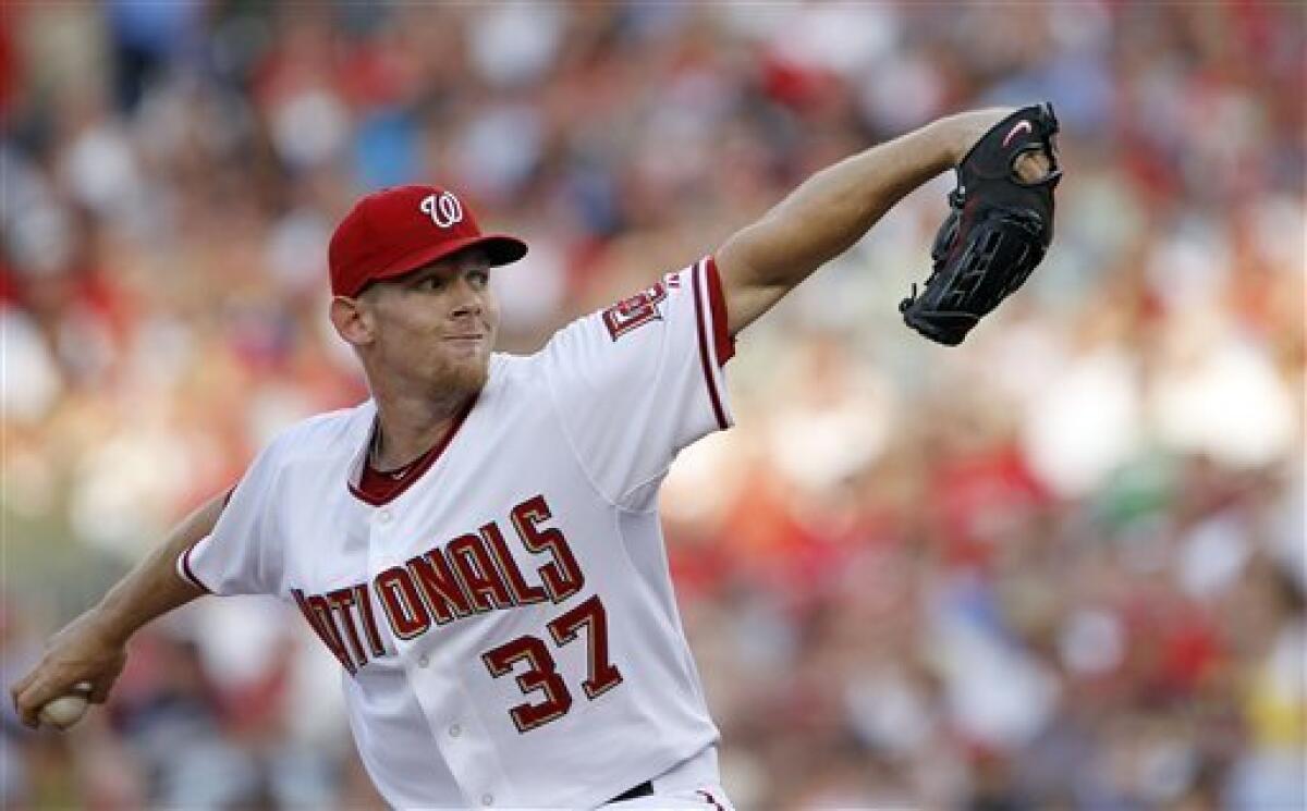 Stephen Strasburg strikes out 14, wins in big-league debut