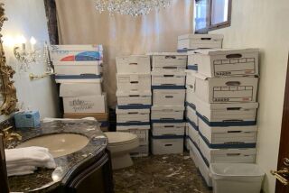 This image, contained in the indictment against former President Donald Trump, shows boxes of records stored in a bathroom and shower in the Lake Room at Trump's Mar-a-Lago estate in Palm Beach, Fla. Trump is facing 37 felony charges related to the mishandling of classified documents according to an indictment unsealed Friday, June 9, 2023. (Justice Department via AP)