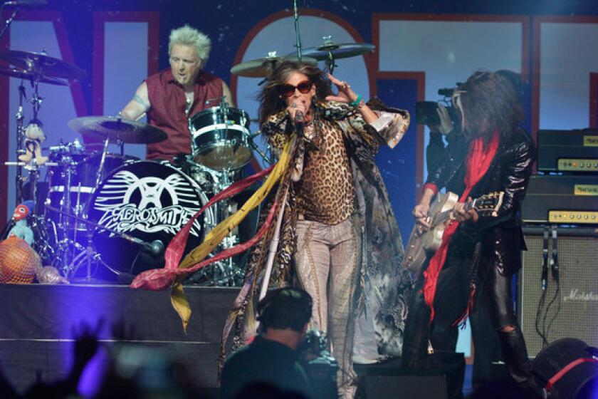 Steven Tyler and Aerosmith perform during the Boston Strong concert Thursday night at TD Garden.