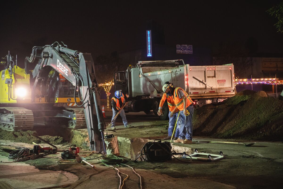 Construction workers on 30th Street in North Park have been working at nighttime to avoid impacting local businesses.