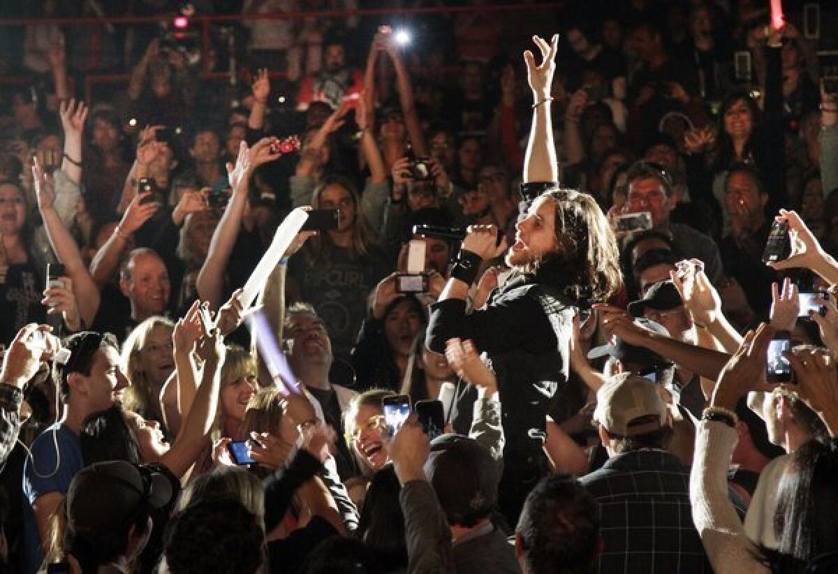 Thirty Seconds to Mars' Jared Leto gets the set rolling amid the audience at KROQ's annual Weenie Roast at Verizon Wireless Amphitheatre in Irvine on May 18, 2013.