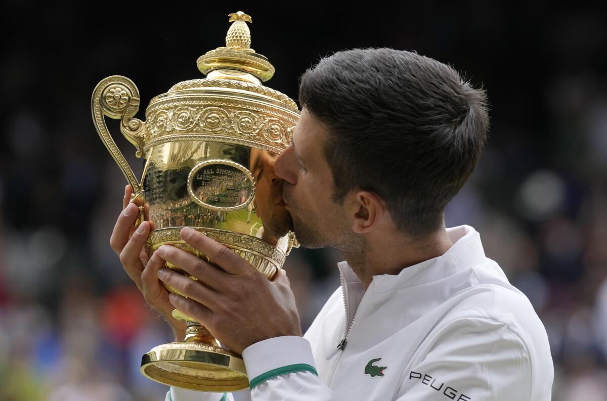 Wimbledon 2021 men's final: Novak Djokovic outlasts Matteo Berrettini to  win record-tying 20th Grand Slam 