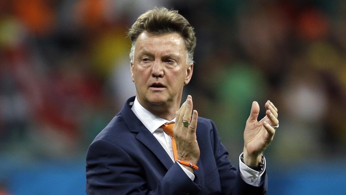 Netherlands Coach Louis van Gaal applauds after his team's World Cup quarterfinal victory over Costa Rica on Saturday. The Netherlands has lost only two of its last 27 matches with van Gaal on the sideline.