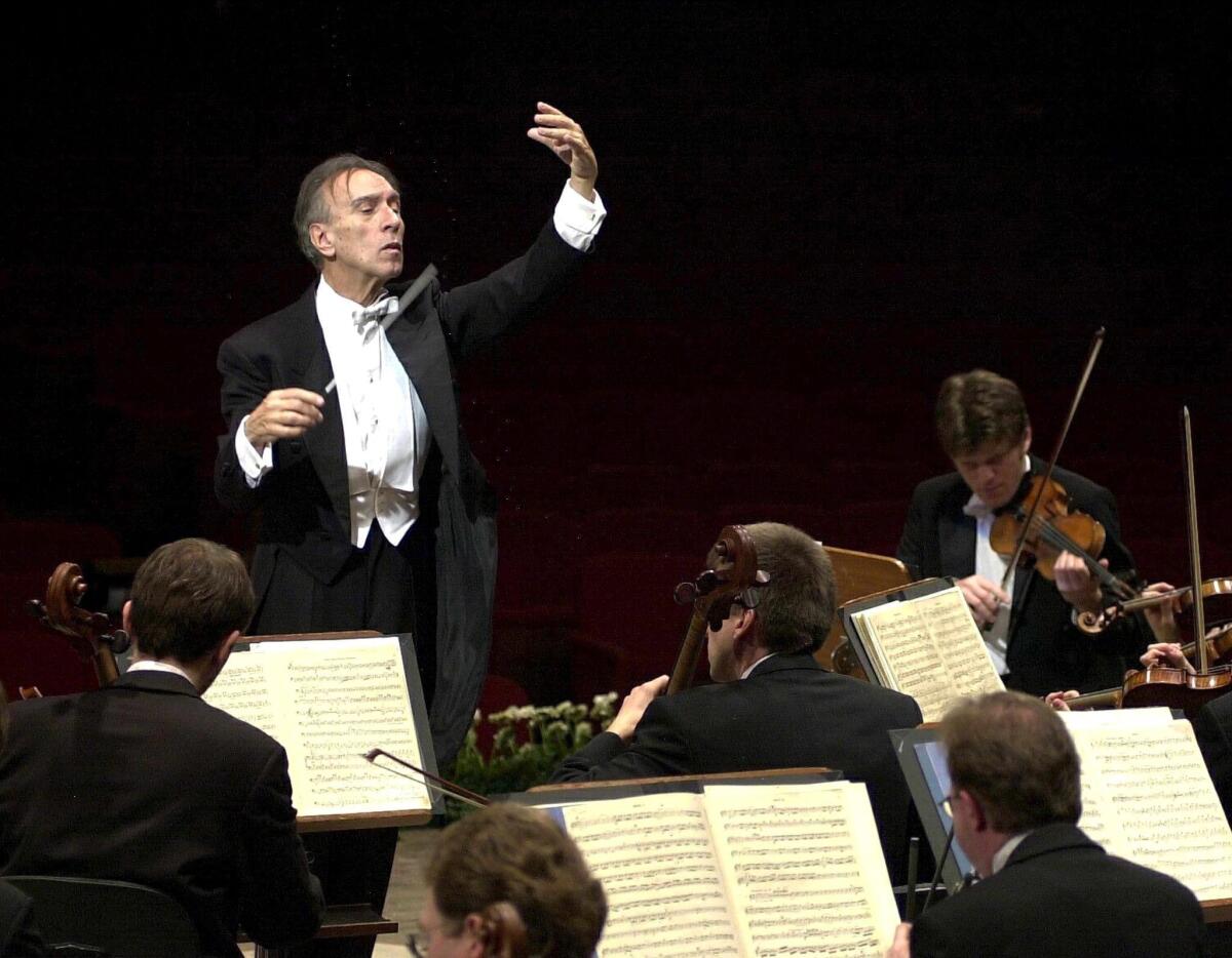 Italian conductor Claudio Abbado, shown in 2001 during rehearsals with the Berlin Philharmonic Orchestra has died at the age of 80 in Bologna.