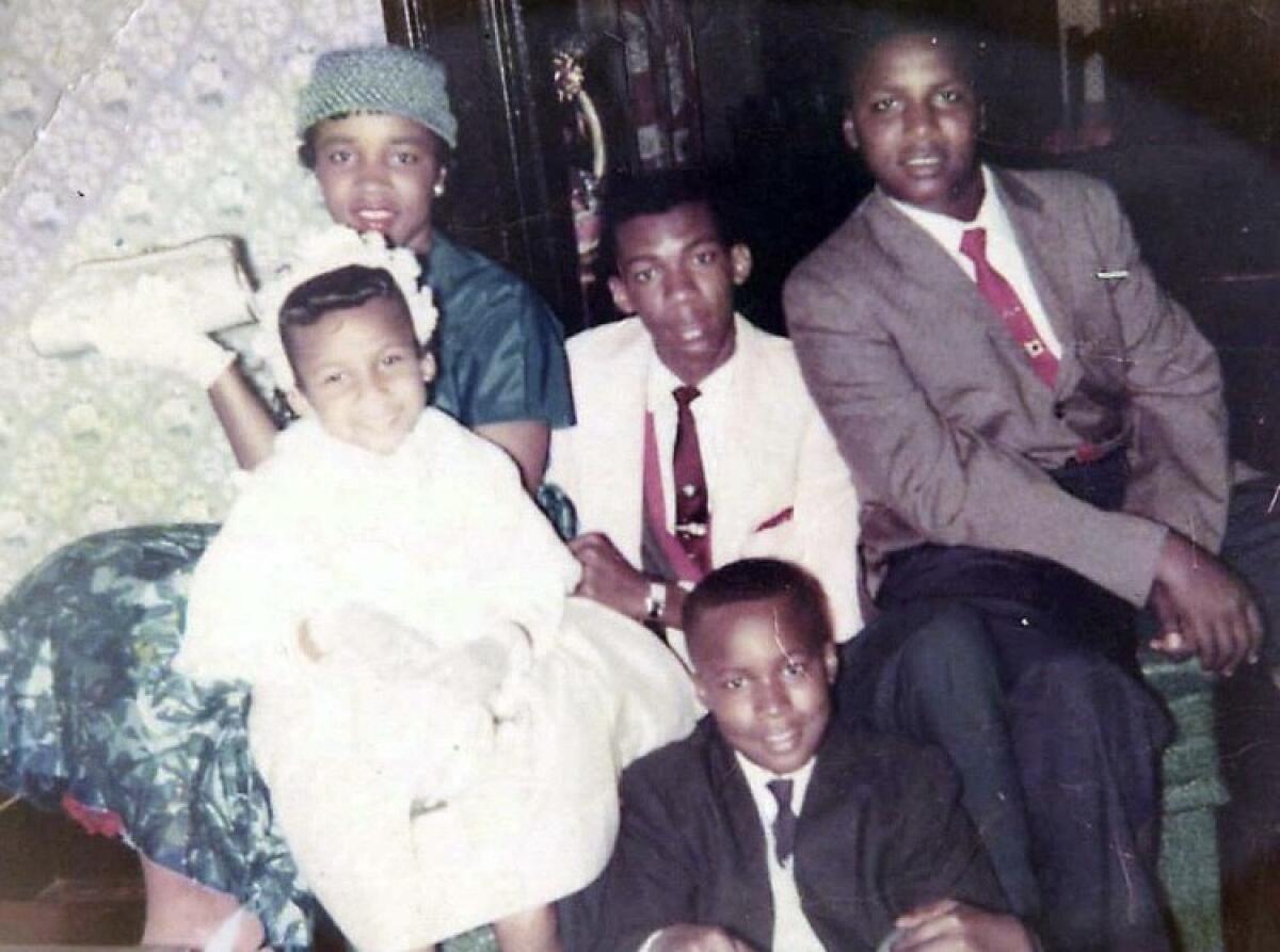 Big Willie, center, sits for a family photo with his four younger siblings, from left, Jean, Gwendolyn, Kenneth and Don Ray. (Courtesy of Jean Davis-Hatcher)