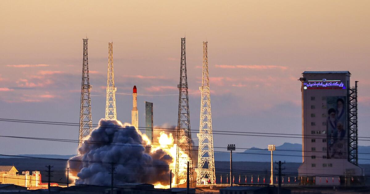 Iran says it conducted space launch in a program criticized by West; nuclear watchdog adds warning