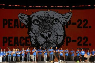 LOS ANGELES, CA - FEBRUARY 4, 2023 - Students with San Pascual STEAM Magnet Elementary School sing there original song, "P-22 We Love You," while playing ukuleles at the "celebration of life" for L.A.'s famous mountain lion, P-22 at the Greek Theater in Los Angeles on February 4, 2023. The National Wildlife Federation oversaw the event attended by thousands and included presentations by actor Rainn Wilson, Mountain Lion Biologist Jeff Sikh, Congressmen Adam Schiff and Ted Lieu, National Geographic photographer Steve Winter and Native American representatives with the Gabrielino Tongva and Chumash. (Genaro Molina / Los Angeles Times)