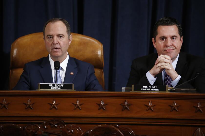 Mandatory Credit: Photo by ANDREW HARRER/POOL/EPA-EFE/REX (10482031p) Representative Adam Schiff, a Democrat from California and chairman of the House Intelligence Committee, left, speaks as Representative Devin Nunes, a Republican from California and ranking member of the House Intelligence Committee, listens during the House Intelligence Committee impeachment inquiry hearing in Washington, D.C., USA, 21 November 2019, on President Donald Trump's efforts to tie U.S. aid for Ukraine to investigations of his political opponents. House Intelligence Committee Holds Hearing On Impeachment Inquiry Of President Trump, Washington, USA - 21 Nov 2019 ** Usable by LA, CT and MoD ONLY **