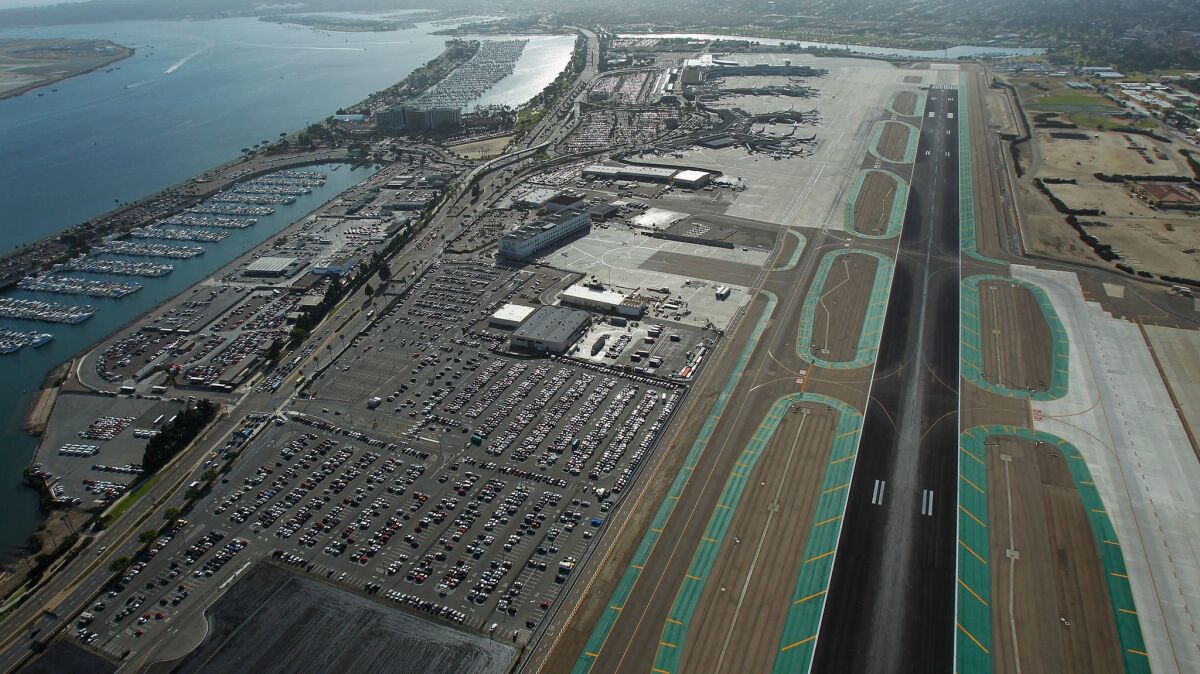 This 2014 aerial shows Lindbergh Field before construction began on a new parking garage and the rental car lot closed across Harbor Drive.