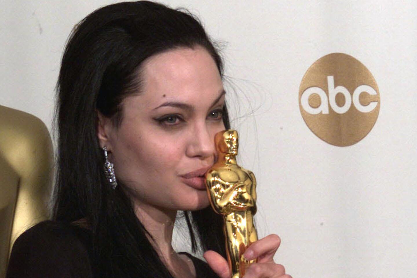 Angelina Jolie kisses older brother before show | 2000