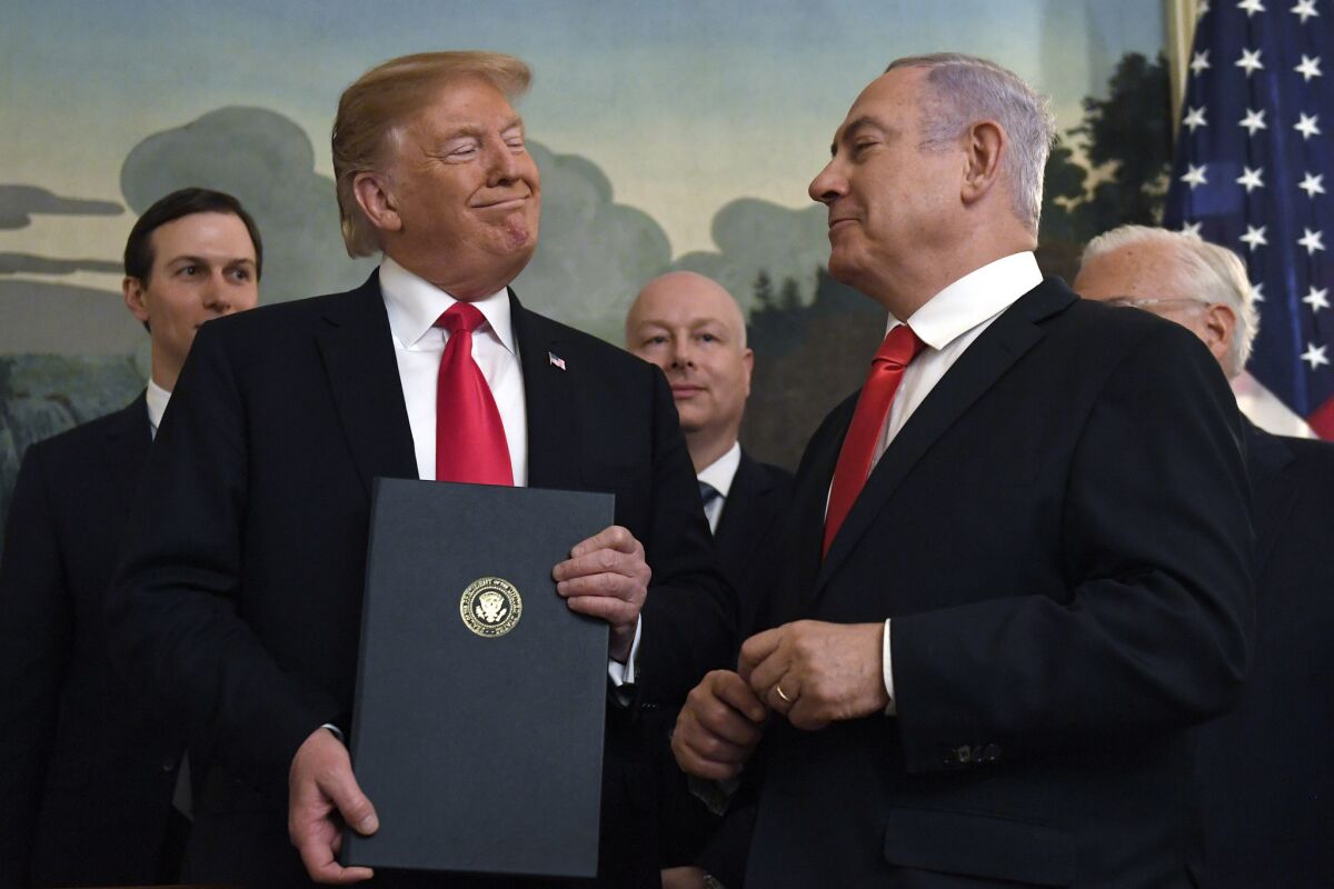 President Trump smiles at Israeli Prime Minister Benjamin Netanyahu