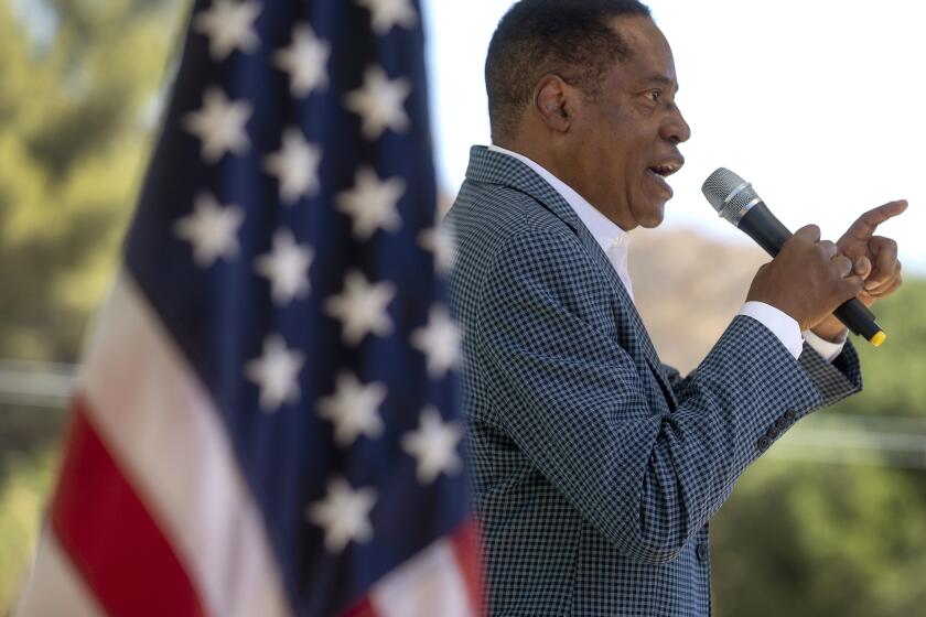 CASTAIC, CA - SEPTEMBER 06, 2021: Gubernatorial candidate Larry Elder addresses the crowd during a rally at Freedom's Way Baptist Church in Castaic. (Mel Melcon / Los Angeles Times)