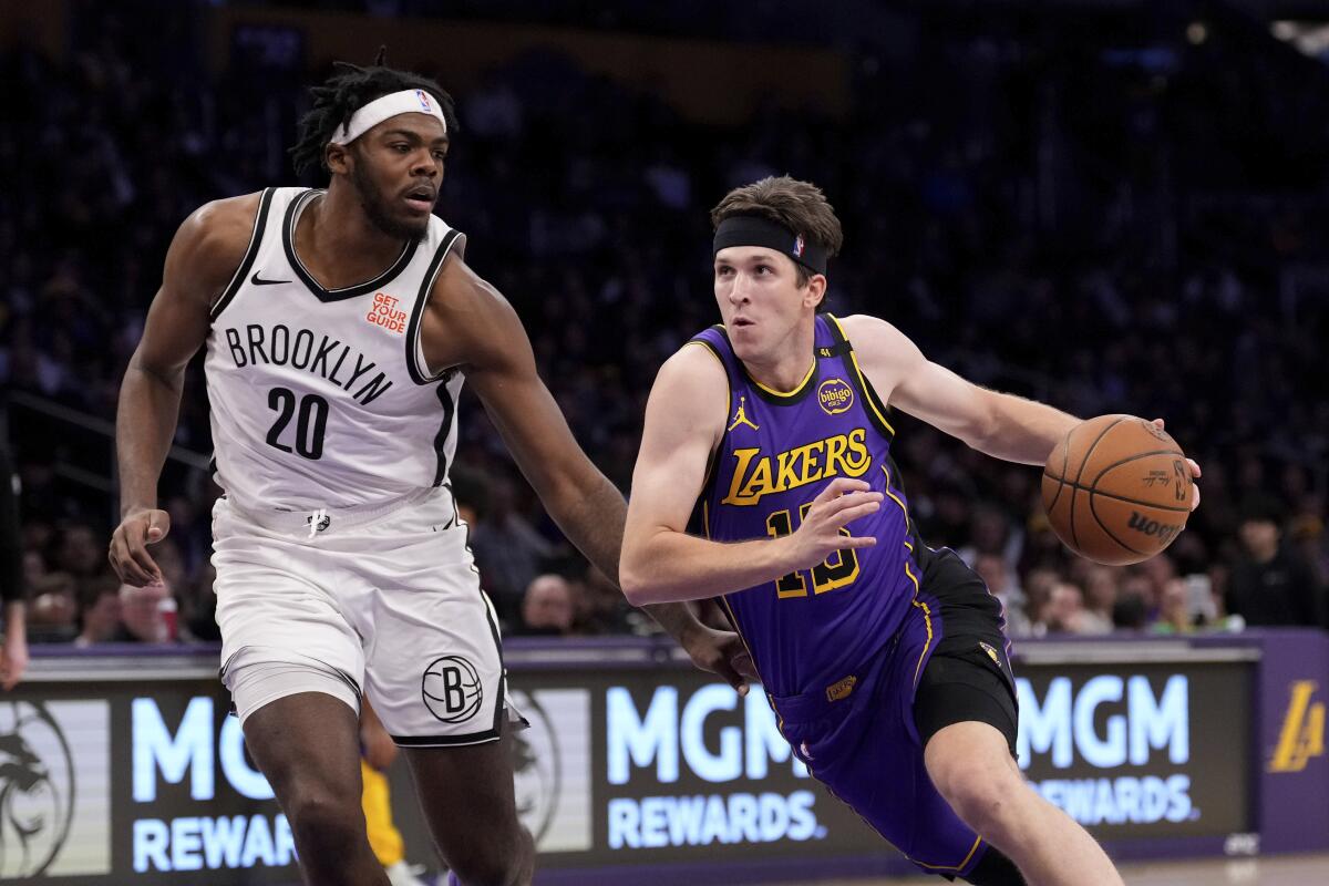 Mesmerizing Reaves Nets Career-high 51, Luka-less Lakers Win Background Illustration Mesmerizing Reaves Nets Career-high 51, Luka-less Lakers Win Background Illustration
