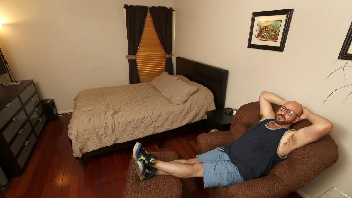 Marc Bochner argues it would be unfair to ban him from hosting short term rentals in his home just because his apartment falls under the Rent Stabilization Ordinance. Bochner was photographed inside the bedroom of the Airbnb that he rents out on Sept. 28.