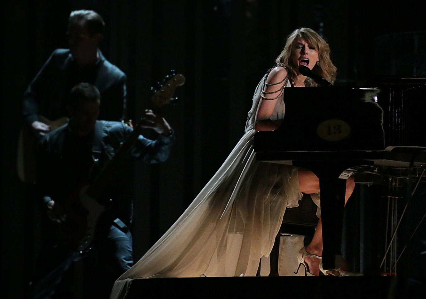 Taylor Swift delivers her song "All Too Well" while playing the piano at the Grammy Awards in January 2014.