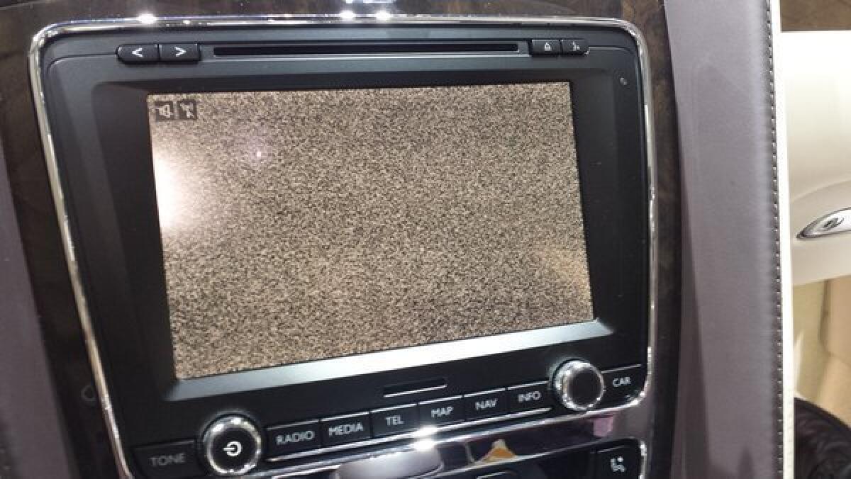 No one wants to see a snowy screen on their car entertainment system, like the one pictured from a Bentley. Car makers are improving the tech in cars, but making a few missteps along the way.
