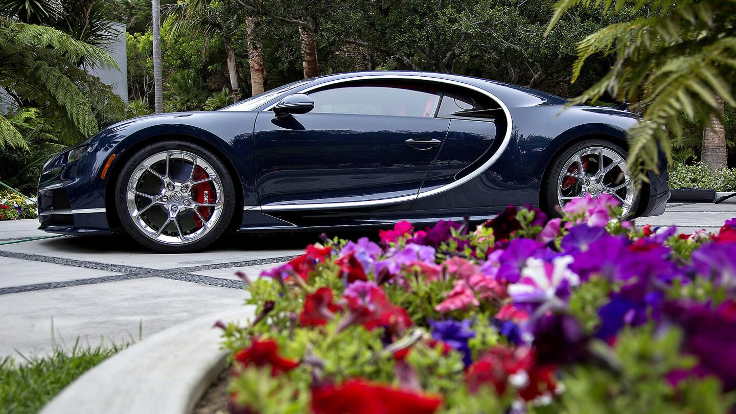 The Bugatti Chiron is a 1,500-horsepower luxury supercar priced at $3 million. Only 500 will be produced.