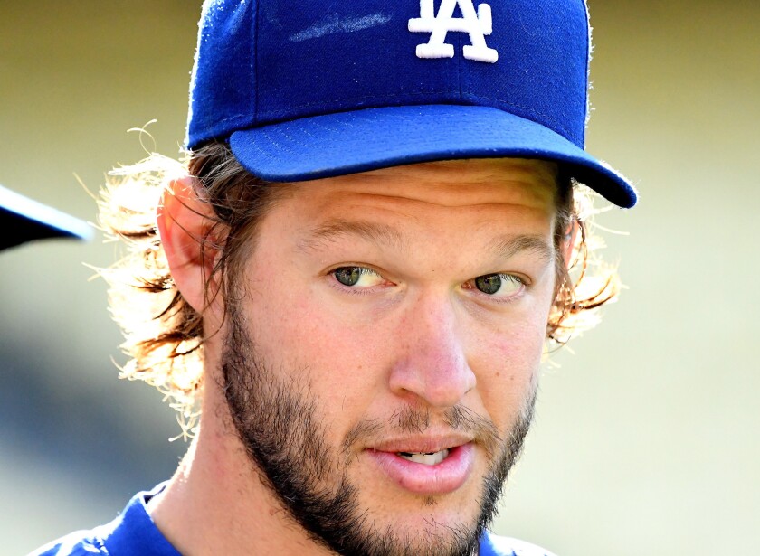 Injured Dodgers starting pitcher Clayton Kershaw before a game against the Chicago Cubs on Aug. 26.