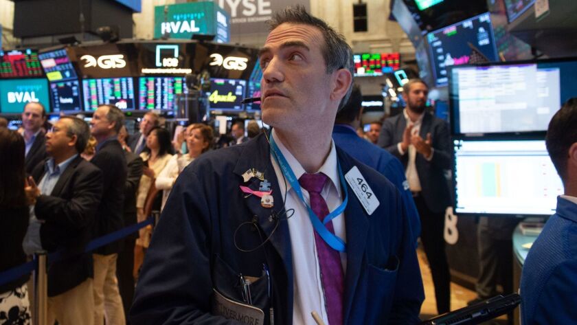 The Dow Jones industrial average has fallen 3.4% over the last eight days. Its last losing streak this long was in March 2017. Above, traders at the New York Stock Exchange on Tuesday.