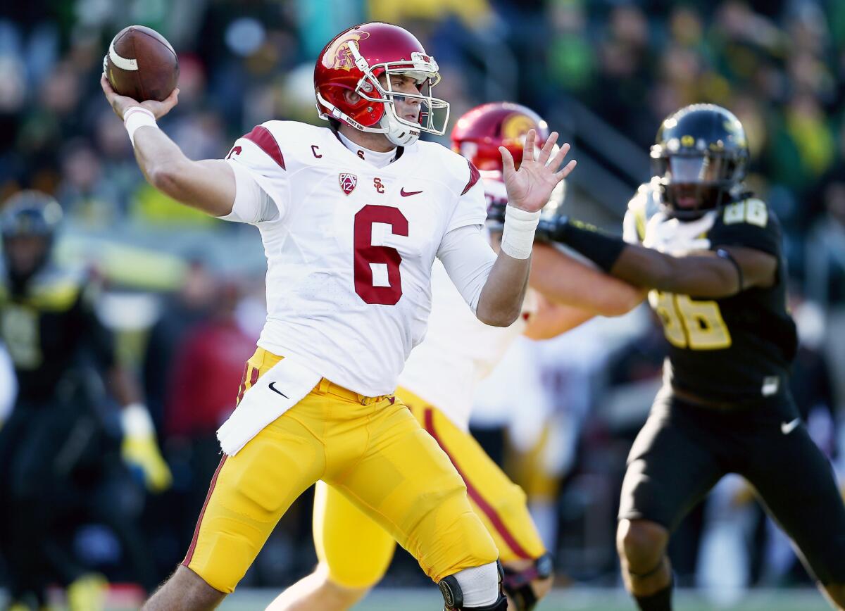 USC quarterback Cody Kessler (6) delivers a pass from the pocket against Oregon in the first half last Saturday.