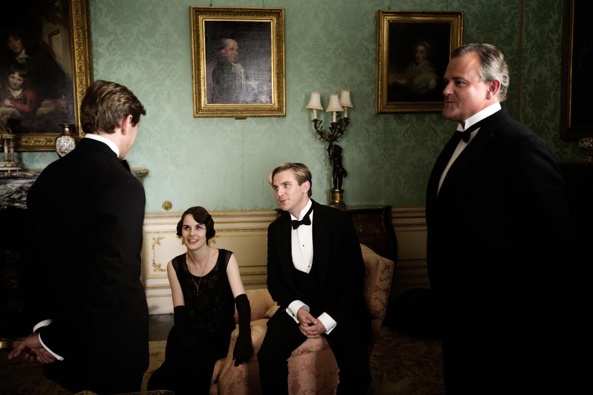 Taking a break while filming Season 3 of "Downton Abbey" are Allen Leech, from left, Michelle Dockery, Dan Stevens and Hugh Bonneville.
