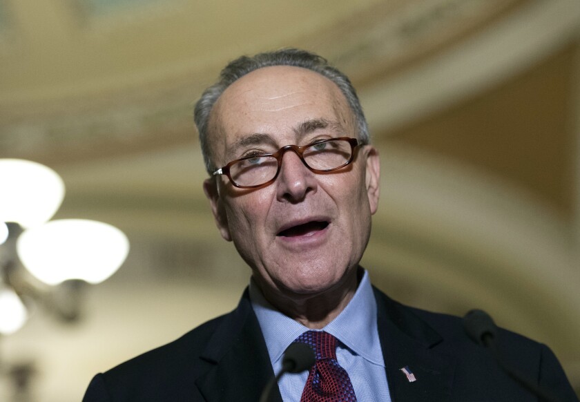 Sen. Charles Schumer, D-N.Y., speaks to the media on Capitol Hill in Washington on Nov. 29.