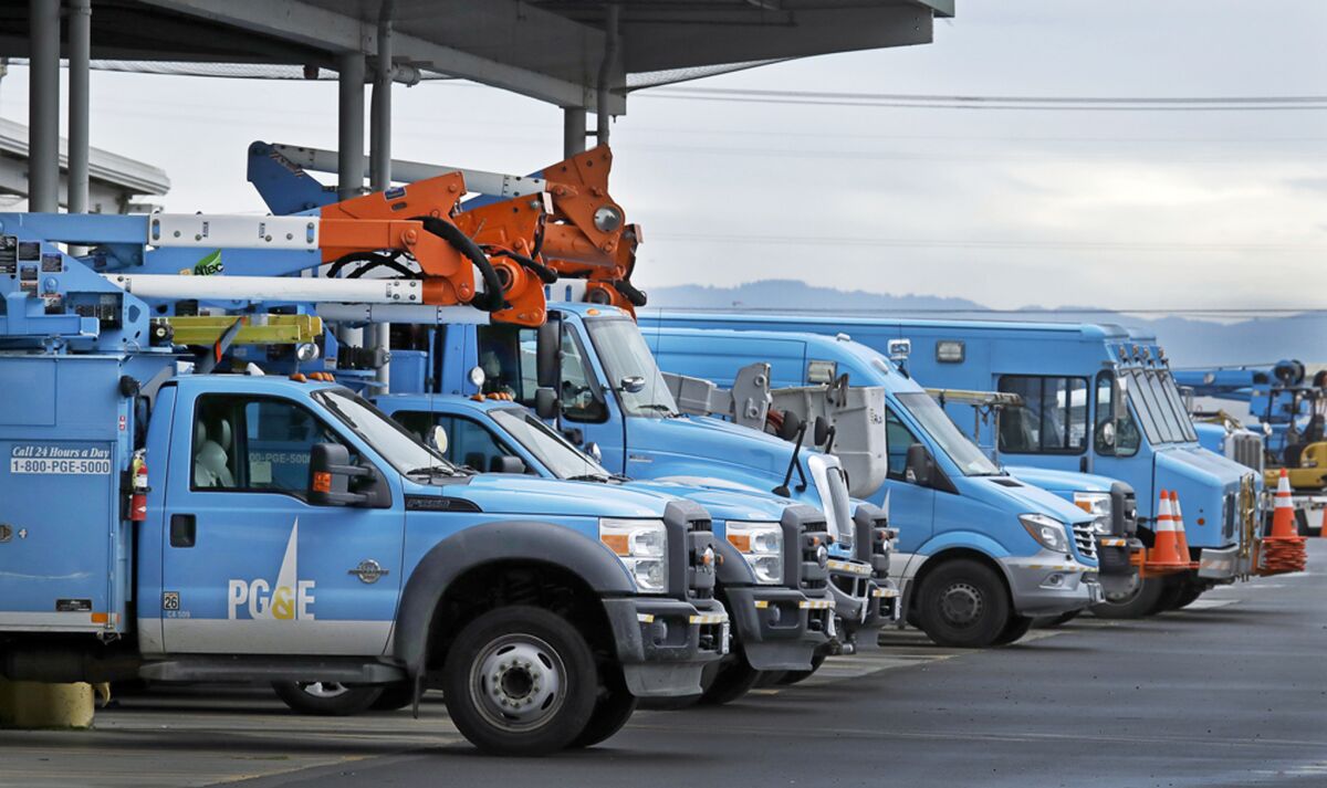 Pacific Gas & Electric vehicles parked at the utility's Oakland Service Center in January. 